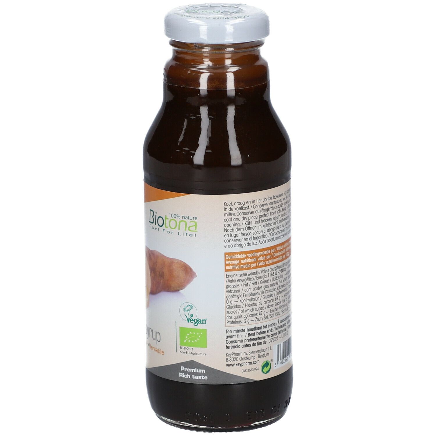 Vue arrière de la bouteille en verre marron. Étiquette avec logo, informations nutritionnelles et label bio.