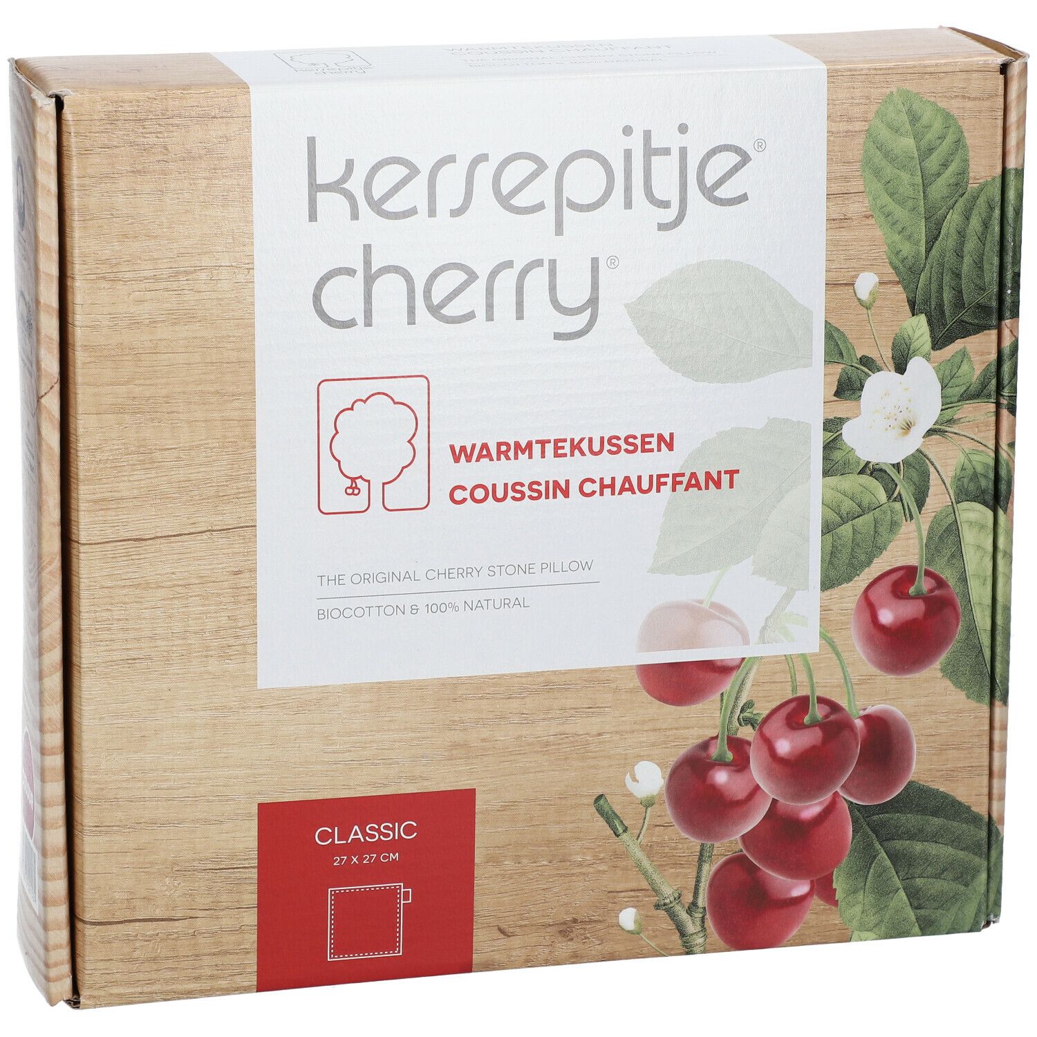 Emballage en carton. Inscription: Kersepitje cherry, coussin chauffant, Classic 27 x 27 cm. Cerises et feuilles.