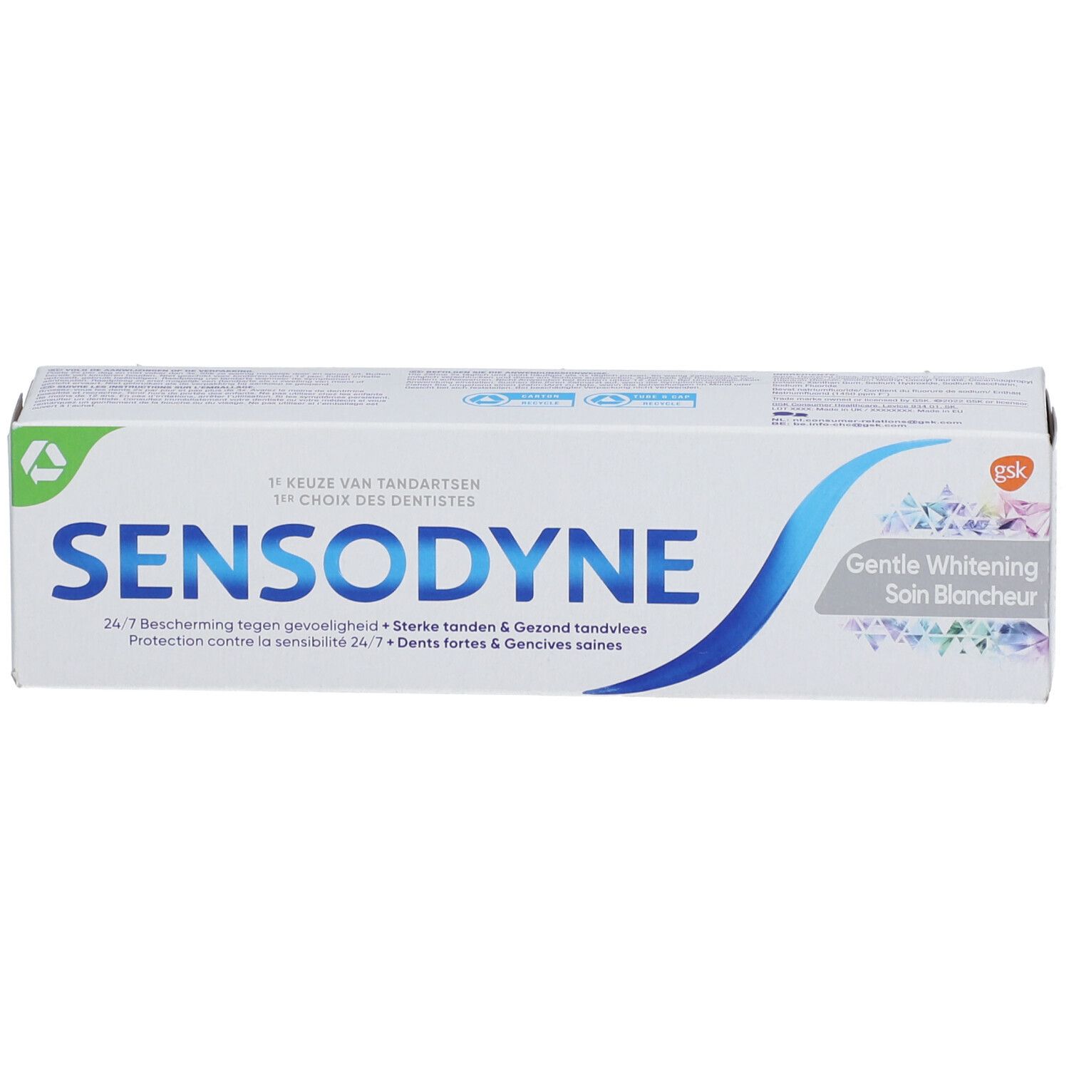 Emballage de dentifrice blanc avec un trait bleu. Inscription SENSODYNE, Gentle Whitening. Texte en plusieurs langues.
