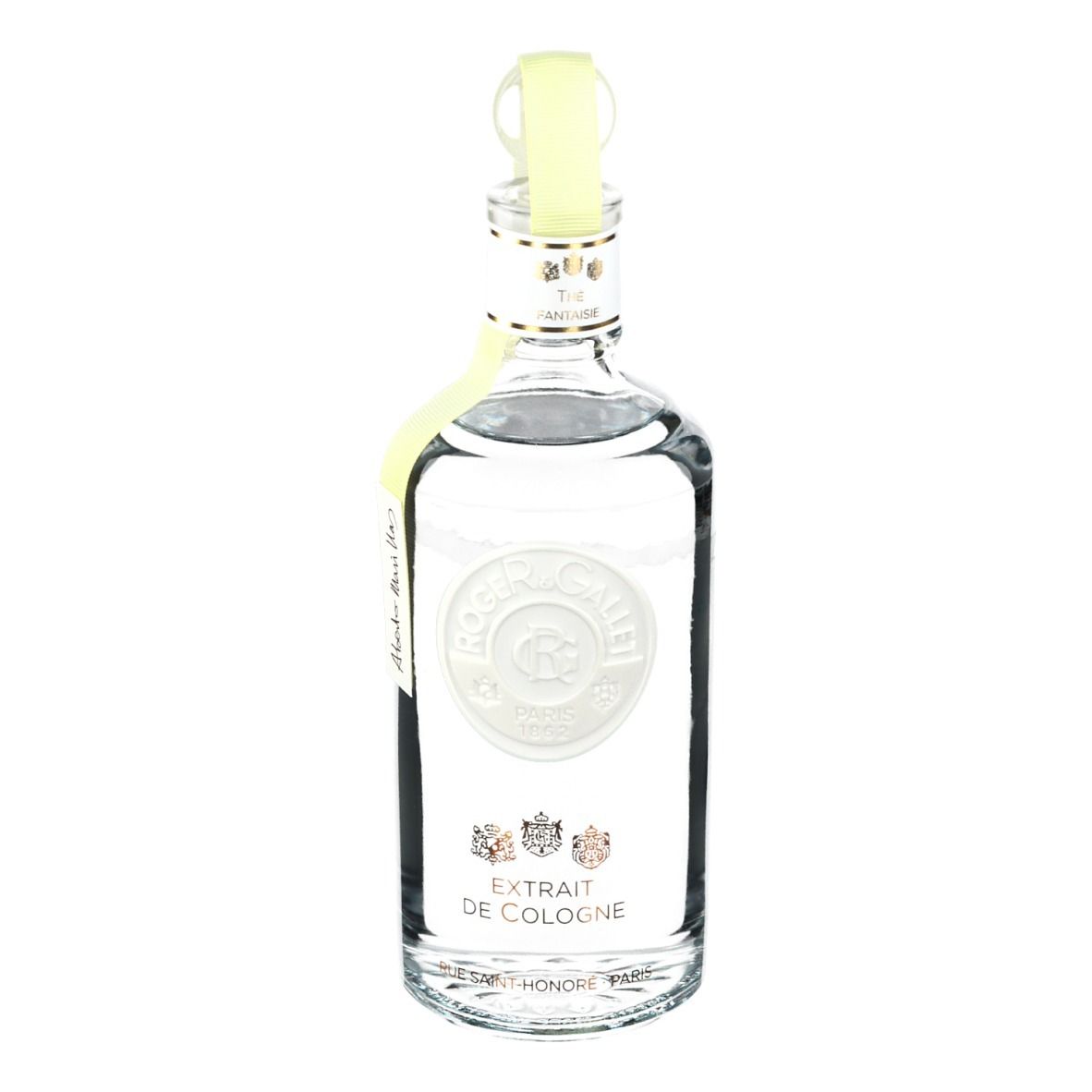 Flacon transparent avec bouchon jaune. Inscription: Roger & Gallet, Extrait de Cologne. Étiquette jaune.
