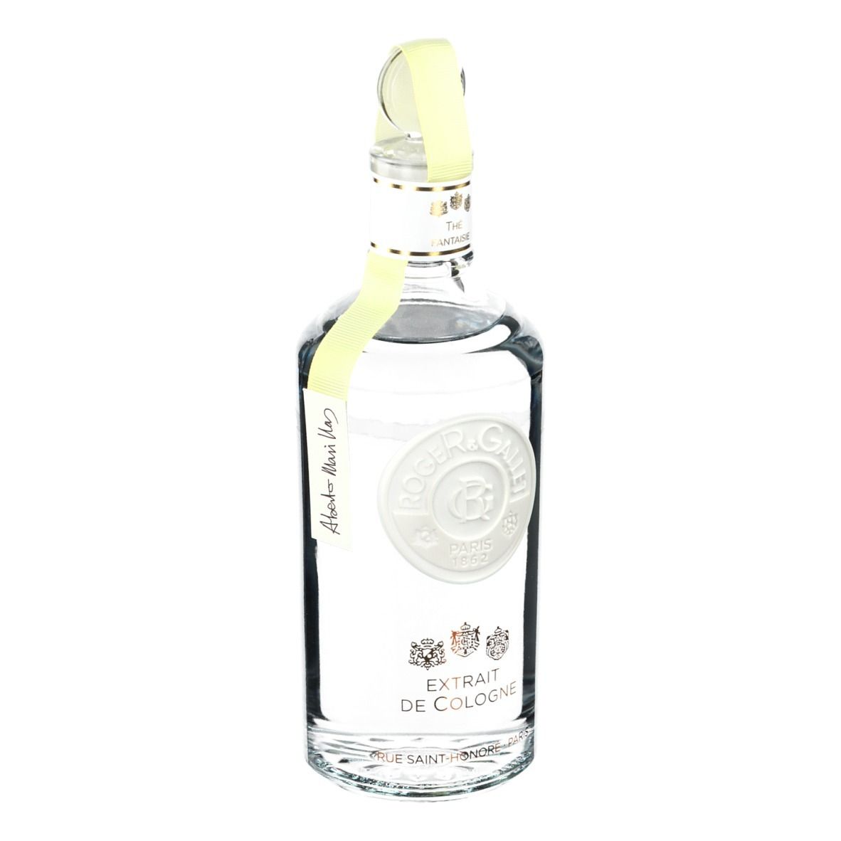 Flacon transparent avec bouchon jaune. Inscription: Roger & Gallet, Extrait de Cologne. Étiquette jaune.