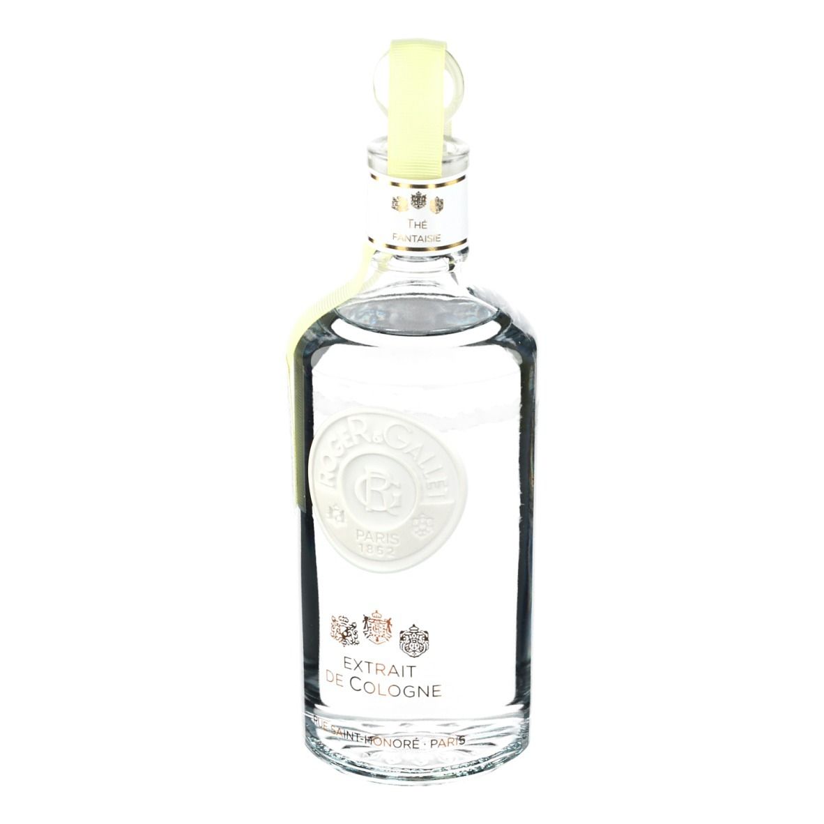 Flacon transparent avec bouchon jaune. Inscription: Roger & Gallet, Extrait de Cologne. Étiquette jaune.