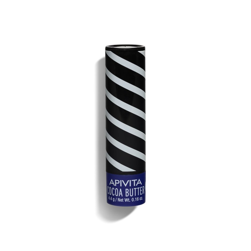 Apivita lippenbalsem met cacaoboter. Cilindrische verpakking met zwart-wit strepen.