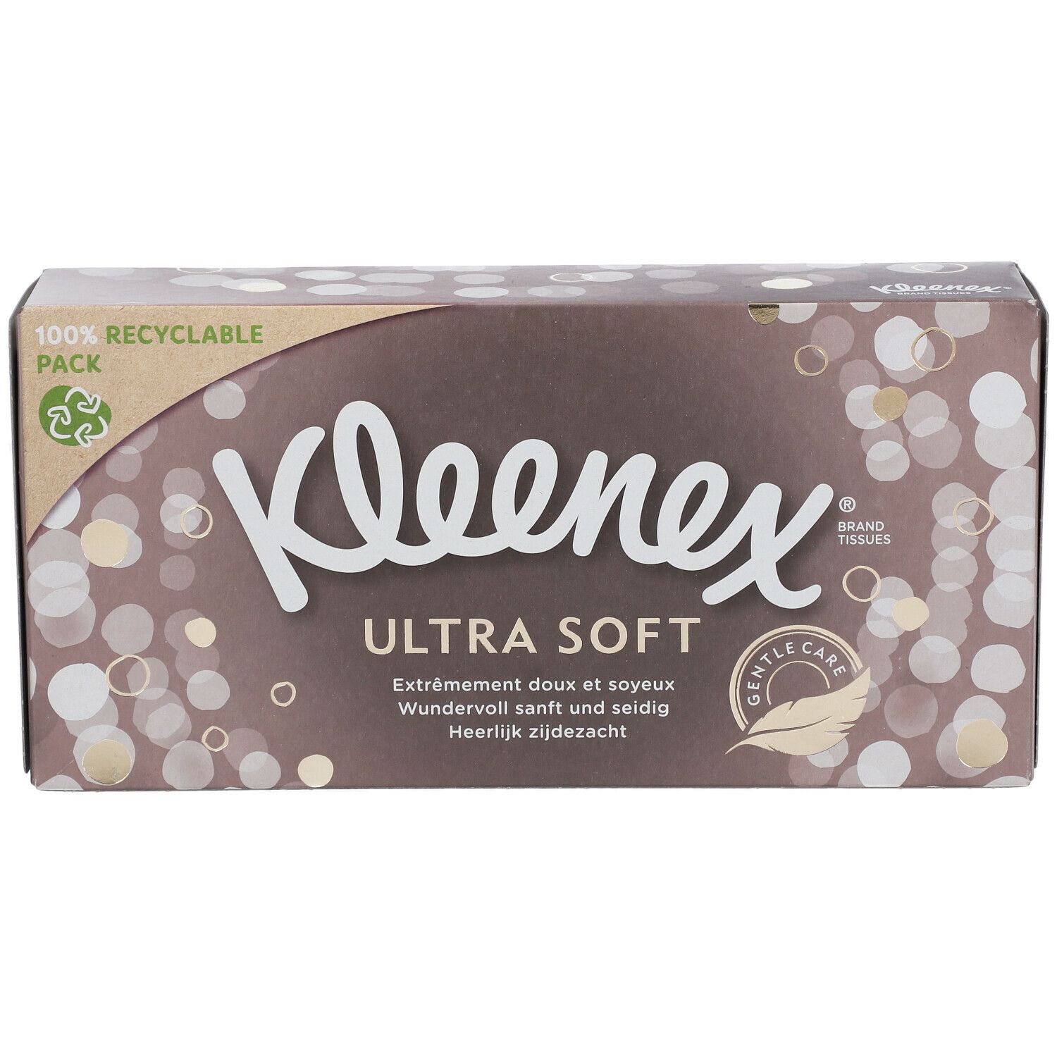 Boîte Kleenex Ultra Soft. Emballage marron avec cercles blancs et dorés. Texte : Ultra Soft, 100% recyclable.