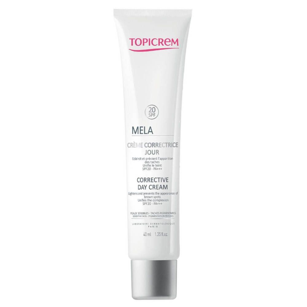 Witte tube met opdruk. Bevat 'TOPICREM', 'MELA', 'SPF 20' en 'CORRECTIVE DAY CREAM'.