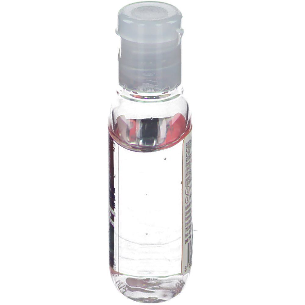 Petit flacon transparent avec bouchon blanc. Liquide visible. Étiquette partiellement visible.