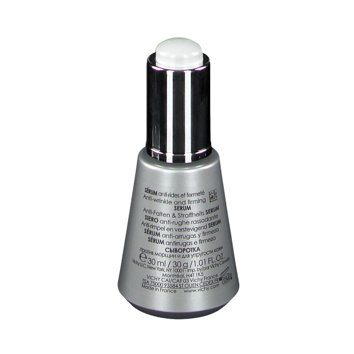 Achterkant van de fles. Meertalige tekst. Opschrift: VICHY, Serum, 30 ml/1.01 FL.OZ. Gemaakt in Frankrijk.