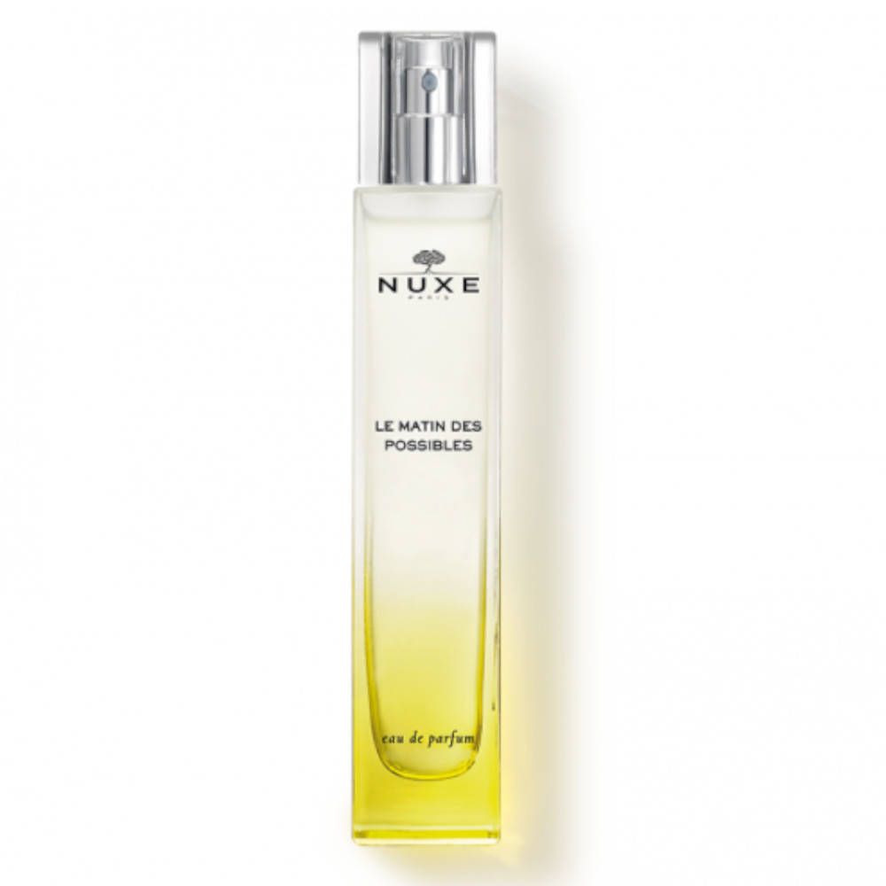 NUXE Eau de parfum Le Matin des Possibles. Fles met sproeikop. Gele en transparante kleurverloop. Logo en productnaam zichtbaar.