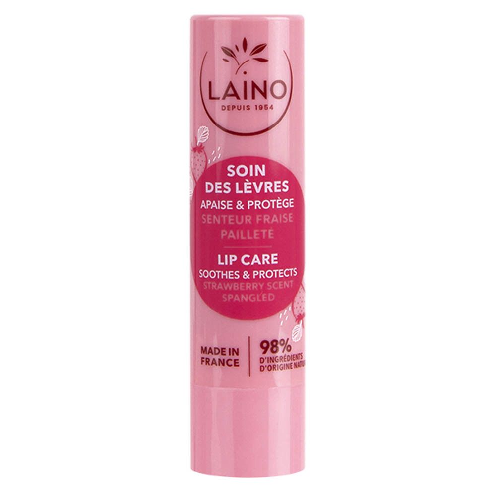 Stick de soin des lèvres rose. Inscriptions: LAINO, SOIN DES LÈVRES, parfum fraise, 98% ingrédients naturels. Fabriqué en France.