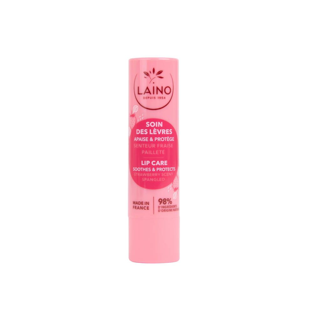 Stick de soin des lèvres rose. Inscriptions: LAINO, SOIN DES LÈVRES, parfum fraise, 98% ingrédients naturels. Fabriqué en France.
