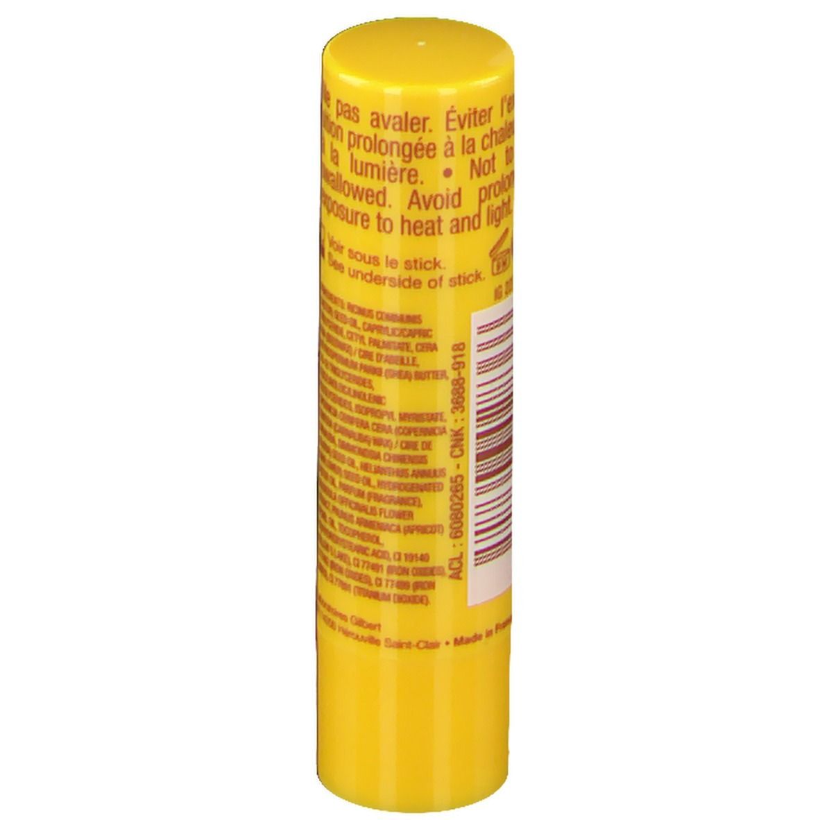 Gelber Lippenpflegestift mit Barcode und Inhaltsstoffen. Rückseite mit Warnhinweisen und Herstellerinformationen.