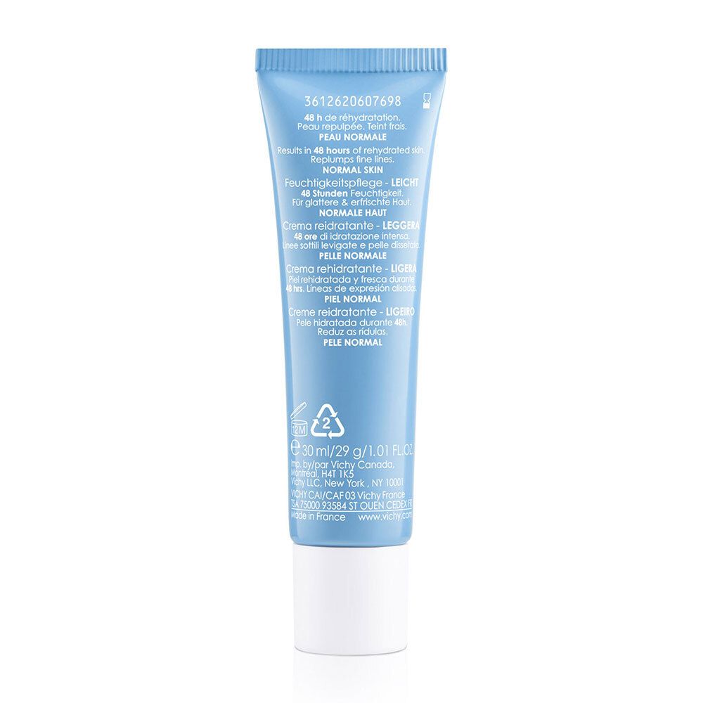 Tube bleu avec bouchon blanc. Texte: Hydratation 48h, peau normale. 30ml.