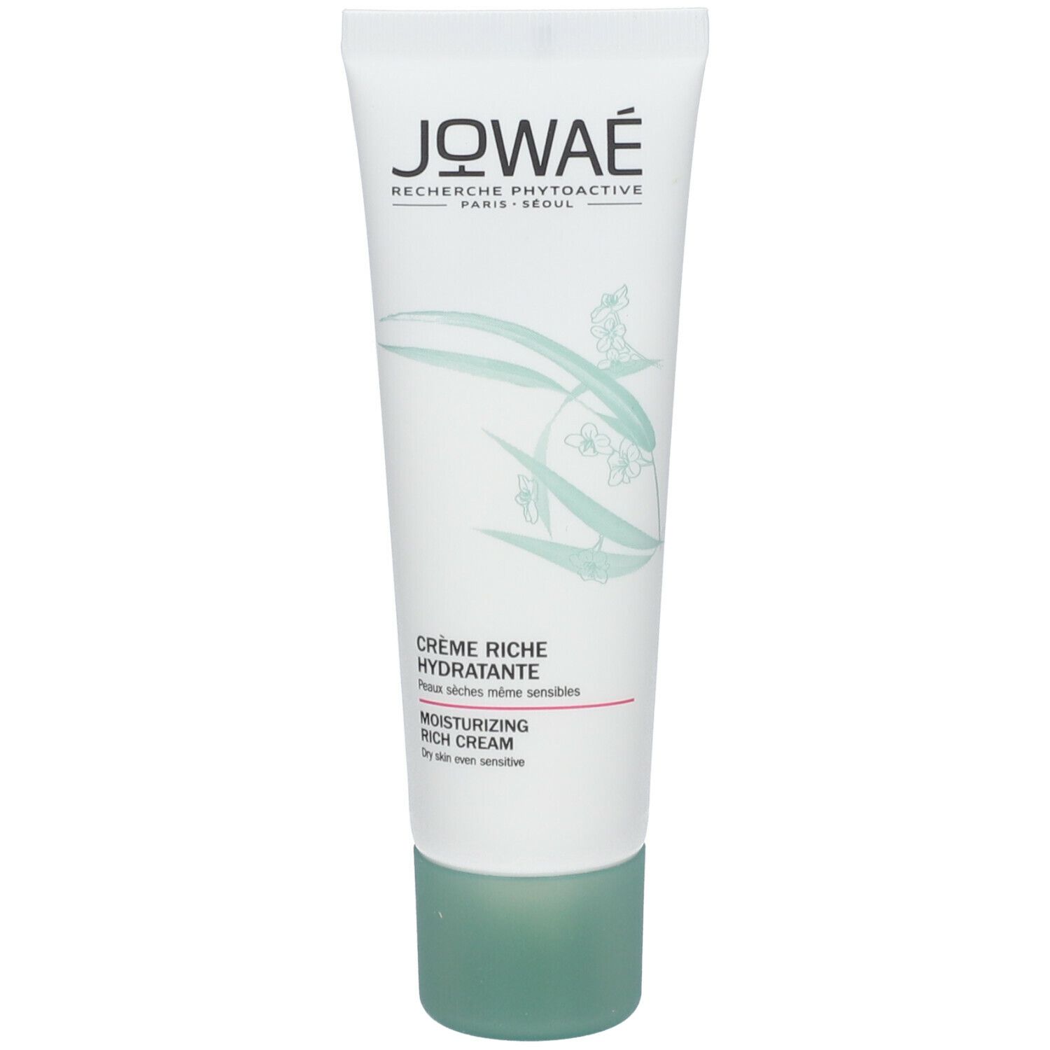 Tube blanc avec bouchon vert. Inscription: JOWAE, Crème Riche Hydratante, Moisturizing Rich Cream. Texte au dos.