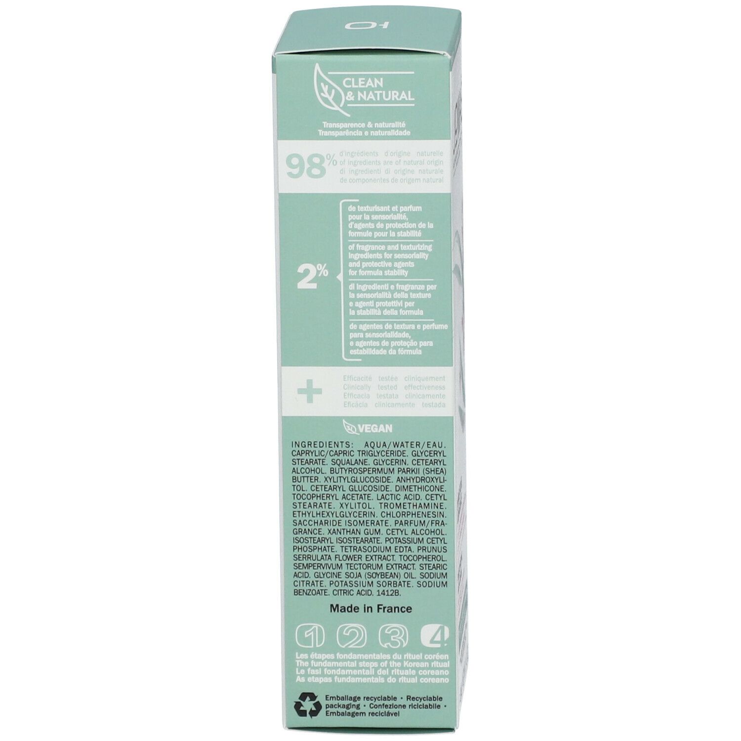 Boîte, côté. Inscription: Clean & Natural, 98% ingrédients d'origine naturelle. Ingrédients.