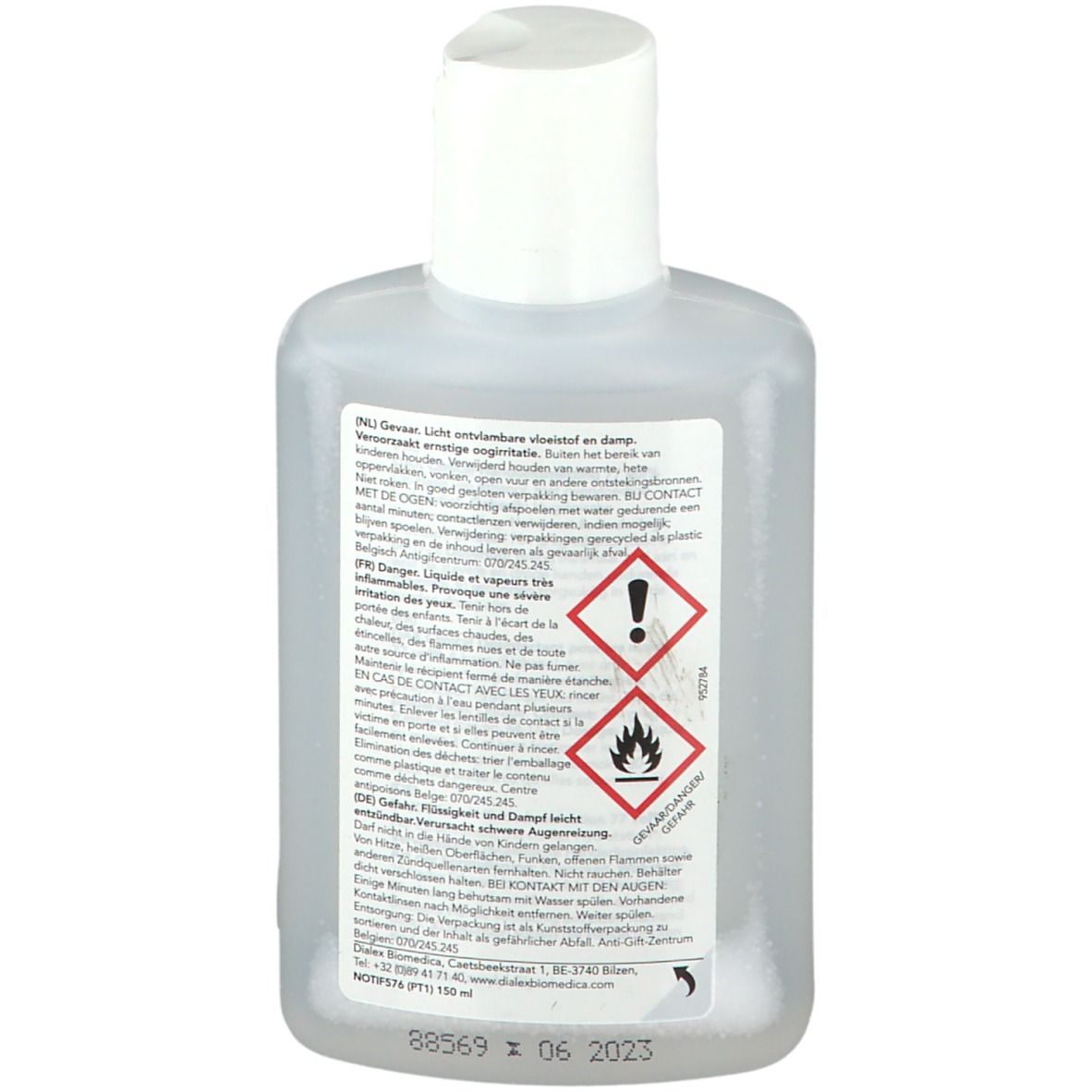 Dos du flacon. Contient des avertissements et des informations sur le produit. Bouchon blanc.
