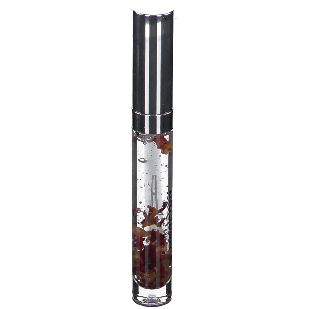 Flacon de gloss transparent avec bouchon argenté. Contient des pétales. Applicateur visible.