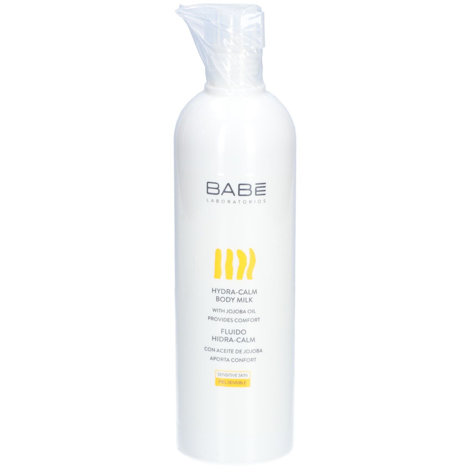 Flacon blanc avec pompe scellée. Inscriptions: BABÉ LABORATORIOS, HYDRA-CALM BODY MILK, FLUIDO HIDRA-CALM. Pour peaux sensibles.