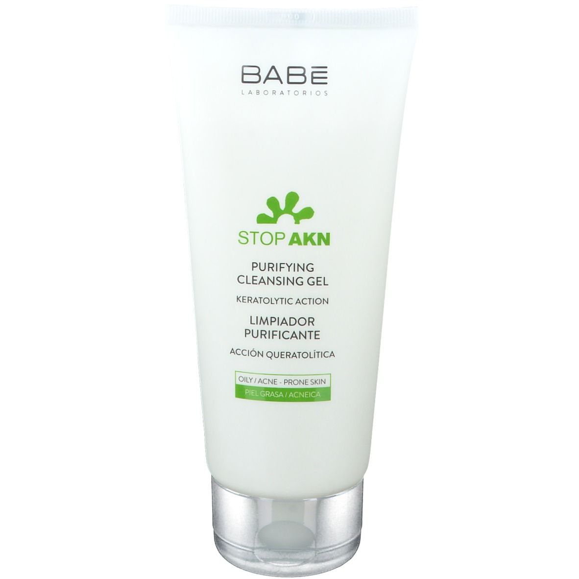 Tube blanc avec impression verte. Texte: BABÉ, STOP AKN, Purifying Cleansing Gel. Pour peaux grasses/à tendance acnéique.