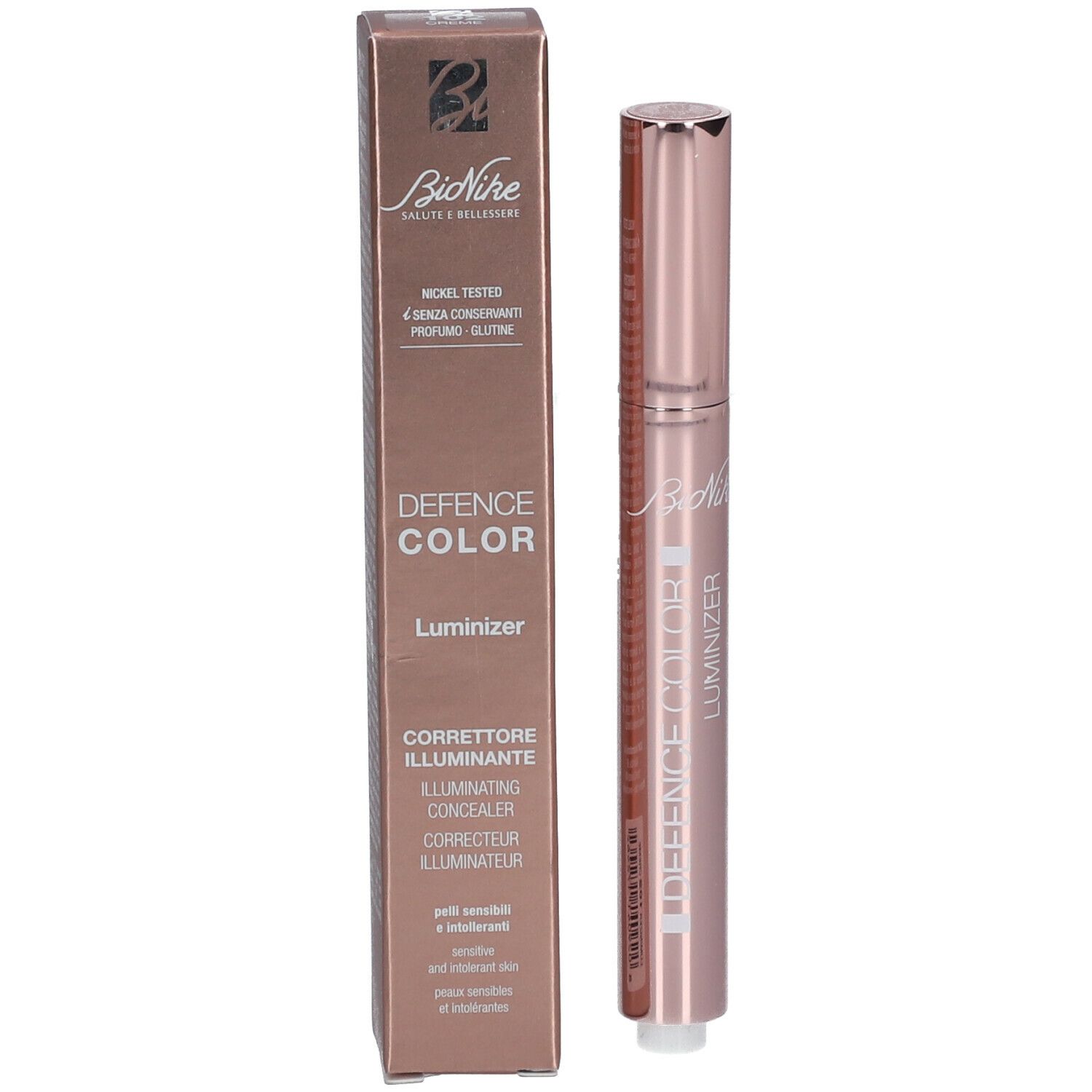 Produkt und Verpackung. Rosafarbener Stift und braune Schachtel. Aufschrift: DEFENSE COLOR LUMINIZER.
