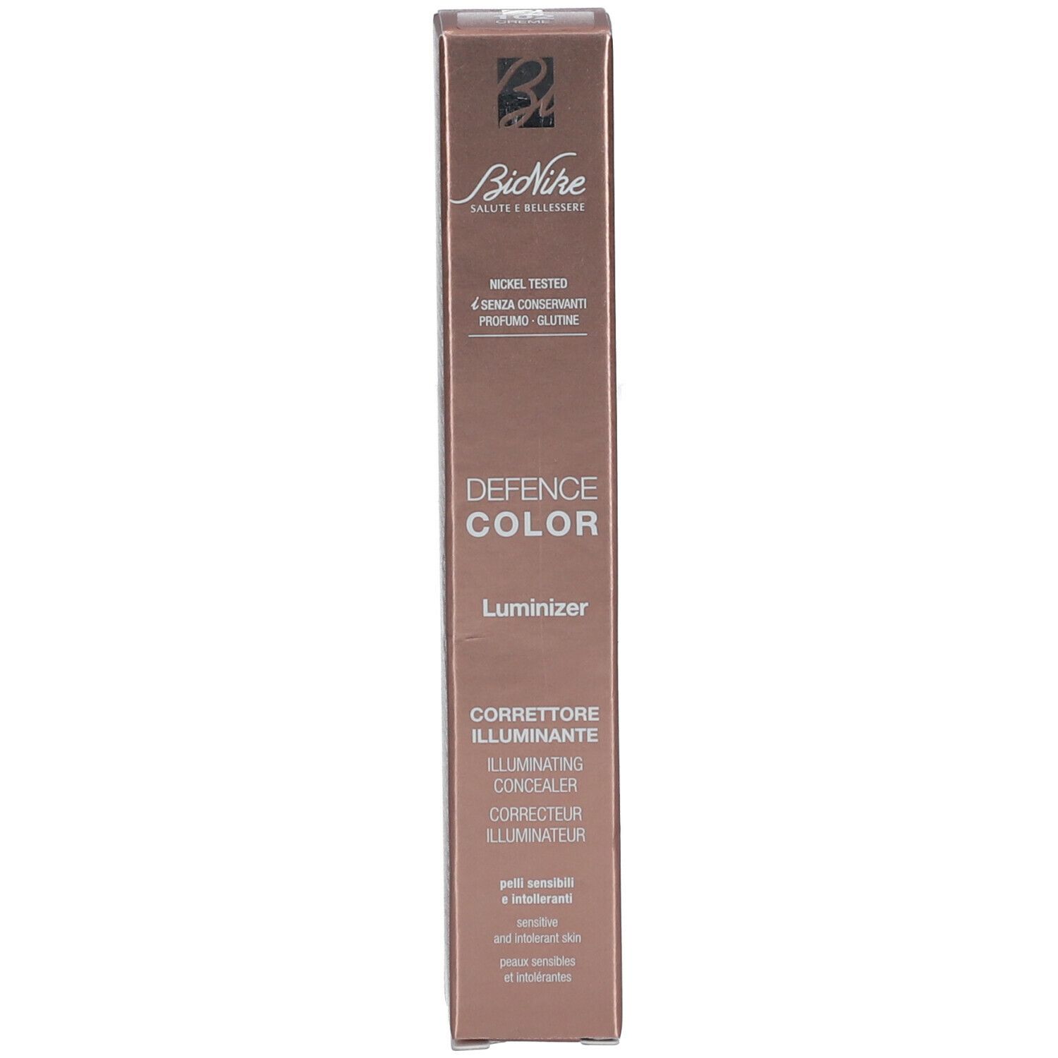 Braune Schachtel. Aufschrift: DEFENSE COLOR LUMINIZER. Nickel getest, ohne Konservierungsstoffe, ohne Parfüm, ohne Gluten.