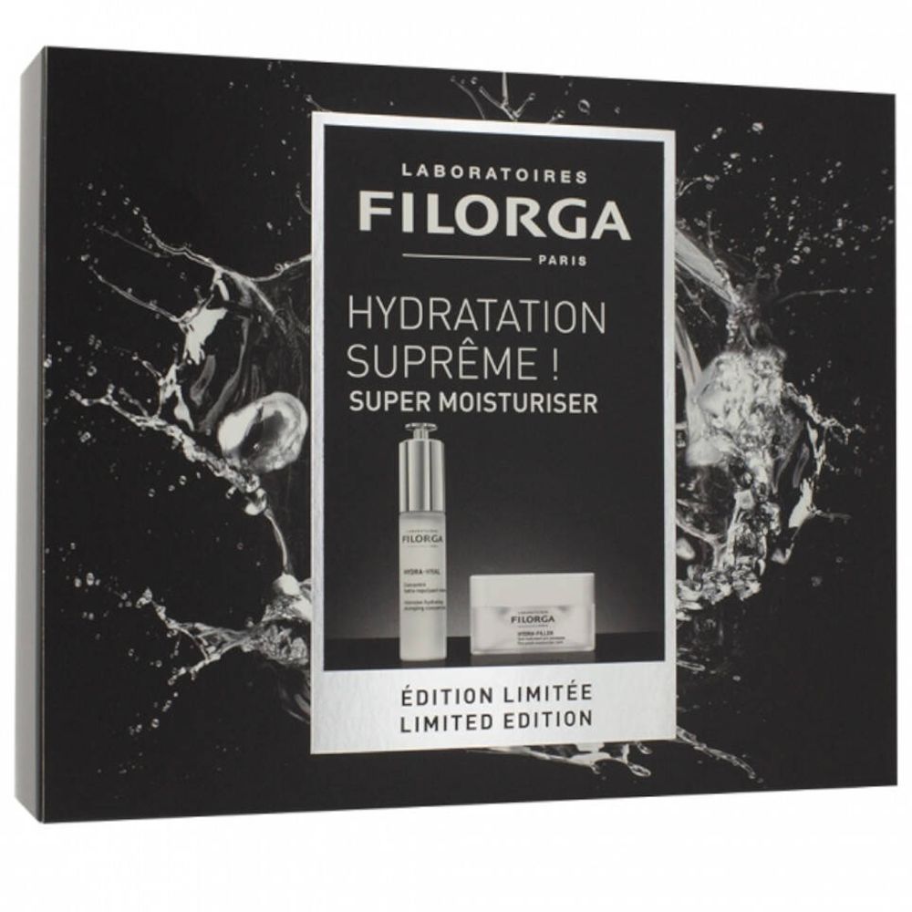 Geschenkset mit Filorga-Produkten. Enthält eine Flasche und einen Tiegel. Schwarzer Hintergrund mit Wasserspritzern. Text: Hydra-Hyal, Super Moisturiser.