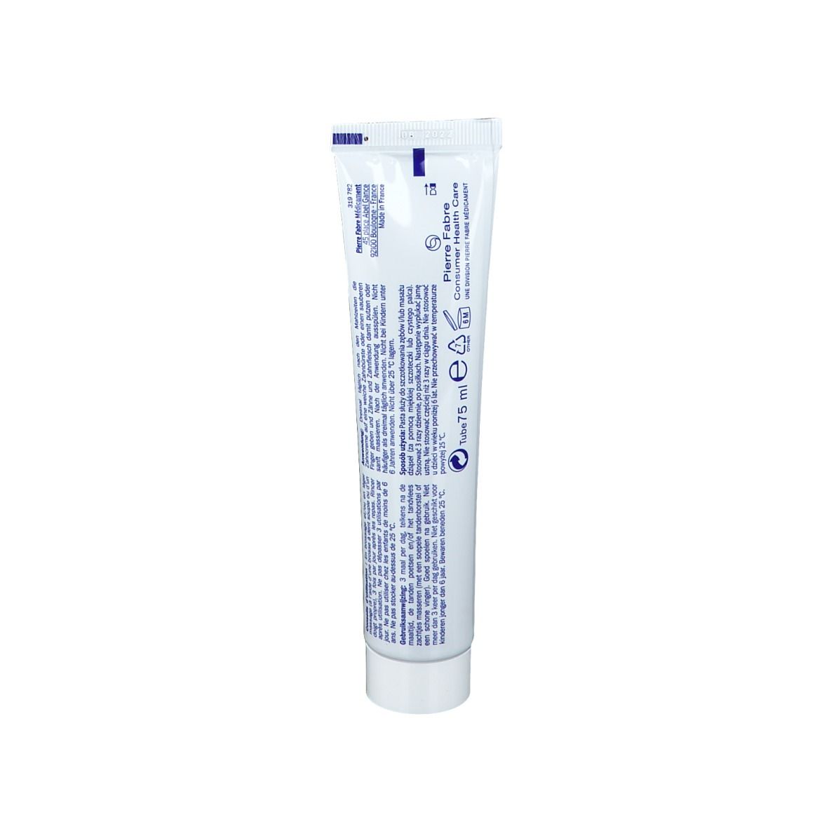 Dos du tube de dentifrice. Texte multilingue, informations fabricant et indication de volume.