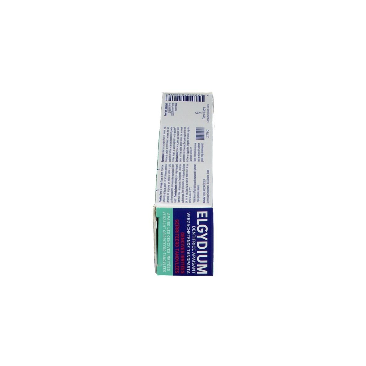 Boîte de dentifrice. Inscription : ELGYDIUM, pour gencives irritées. Texte multilingue.