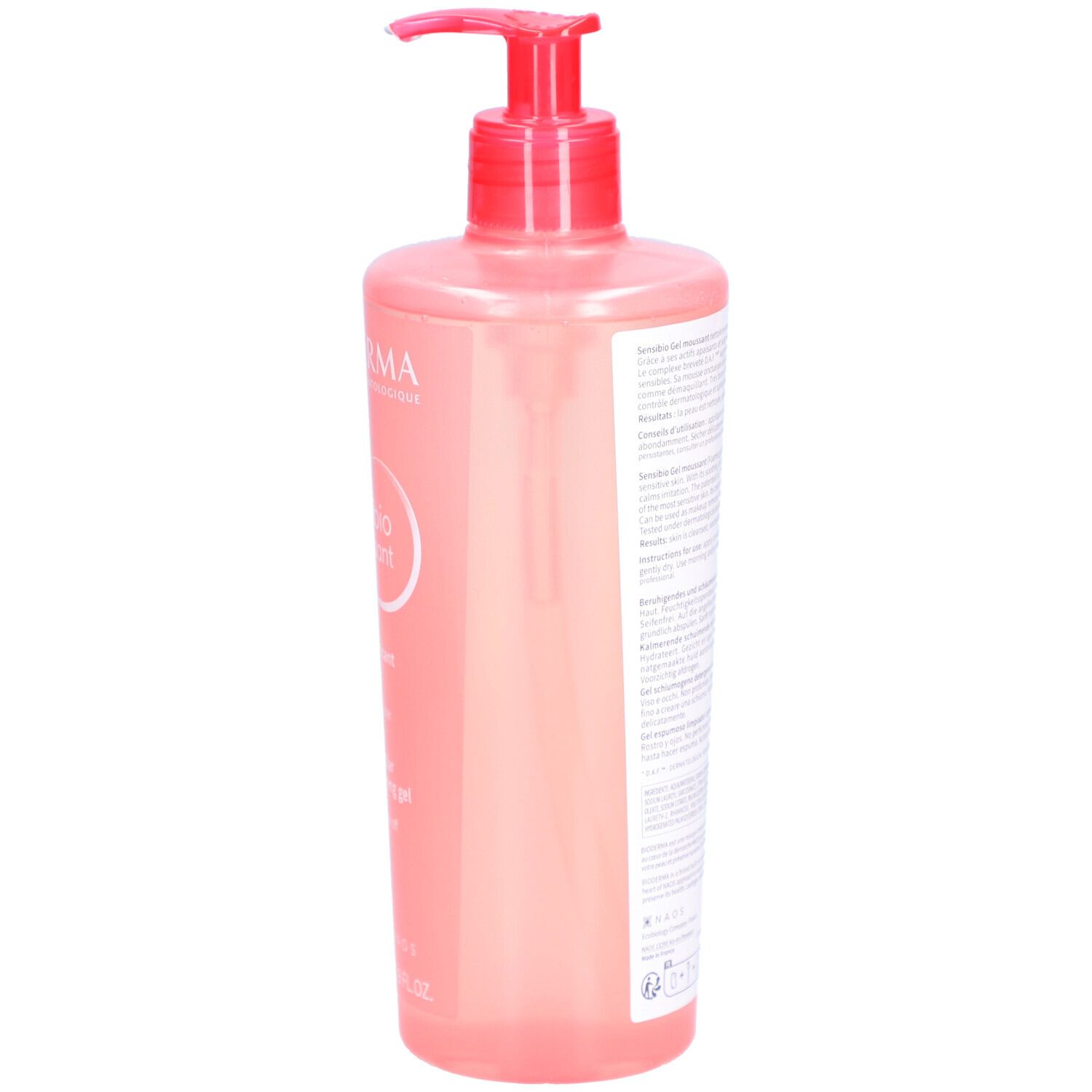 Retro di un flacone rosa con dosatore. Testo in più lingue. Codice a barre e altri simboli.