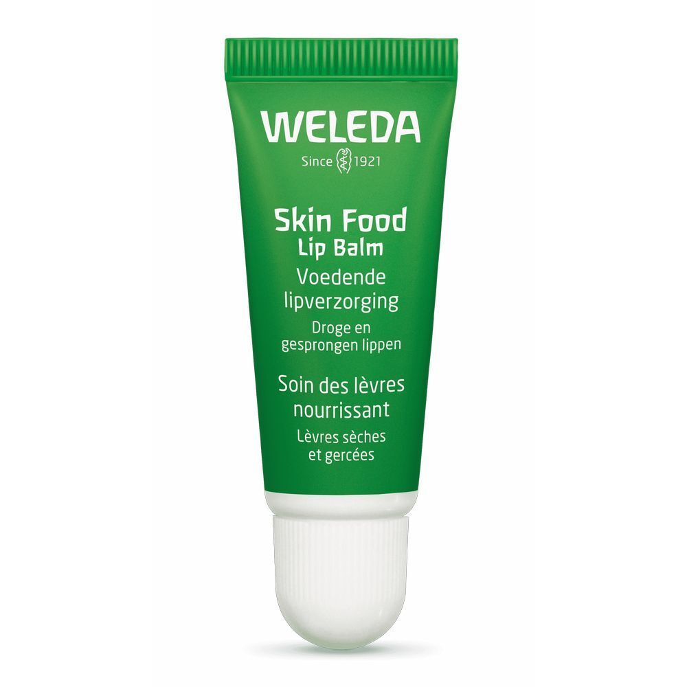 Grüne Tube mit weißem Verschluss. Aufschrift: Weleda Skin Food Lip Balm. Text in Deutsch, Niederländisch und Französisch.