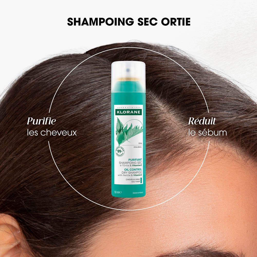 Gros plan sur des feuilles et des gouttes de liquide. Texte : Ortie médicinale & Vitamine E.