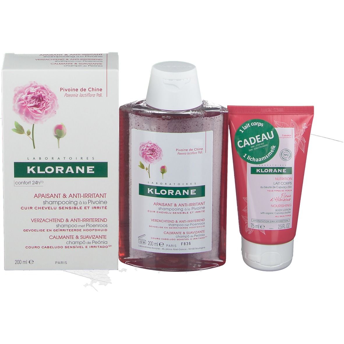 KLORANE shampooing et lait corps avec boîte. Flacon et tube. Liquide rose. Bouchon blanc. Étiquettes roses.