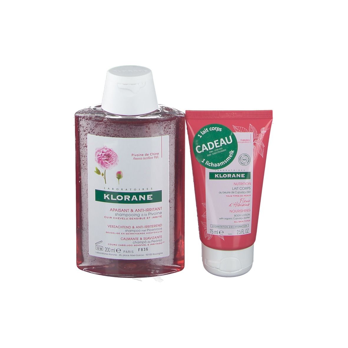 KLORANE shampooing et lait corps. Flacon et tube. Liquide rose. Bouchon blanc. Étiquettes roses avec texte.