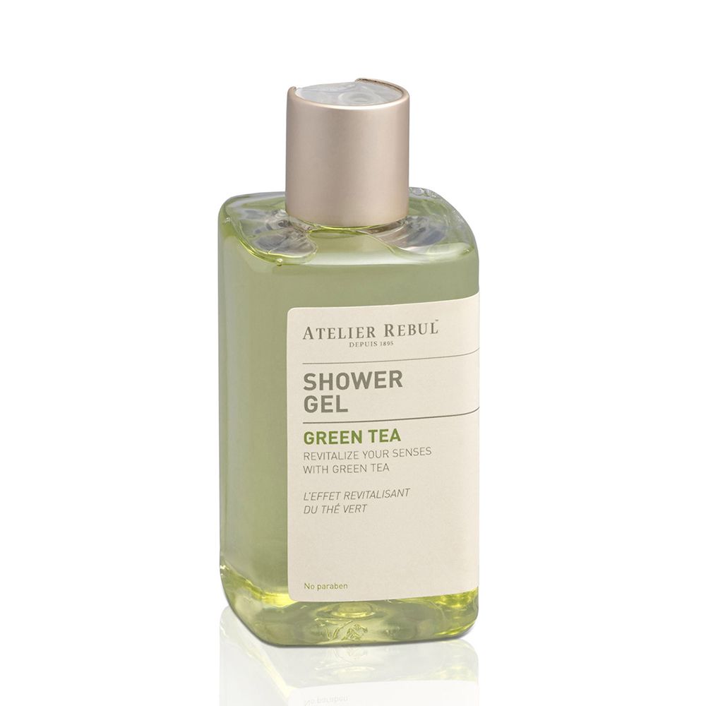 Gel douche vert en flacon rectangulaire à bouchon doré. Étiquette avec texte.
