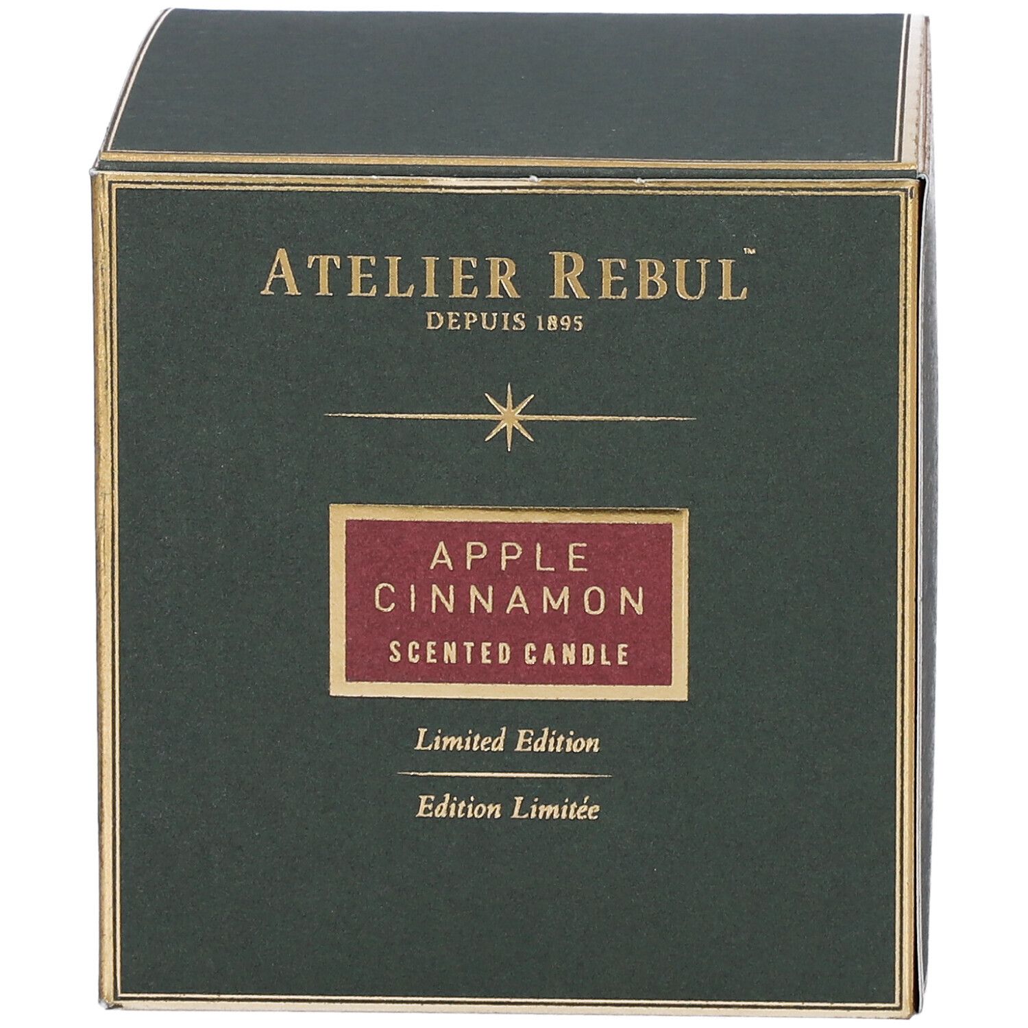 Groene doos met gouden accenten. Opschrift "ATELIER REBUL", "APPLE CINNAMON", "Limited Edition".