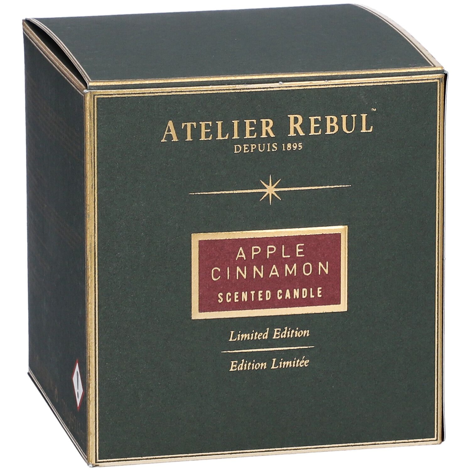 Groene doos met gouden accenten. Opschrift "ATELIER REBUL", "APPLE CINNAMON", "Limited Edition".