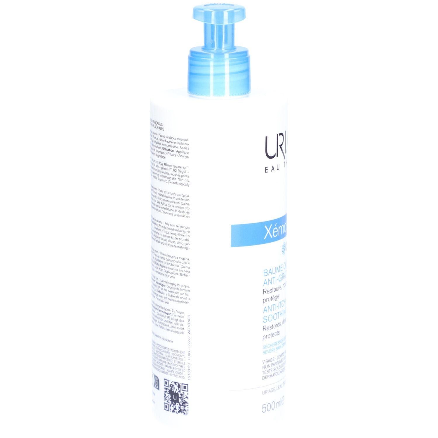 Witte fles met blauwe pomp. Uriage Xémose Anti-jeuk olie-balsem. Achterkant met tekst.