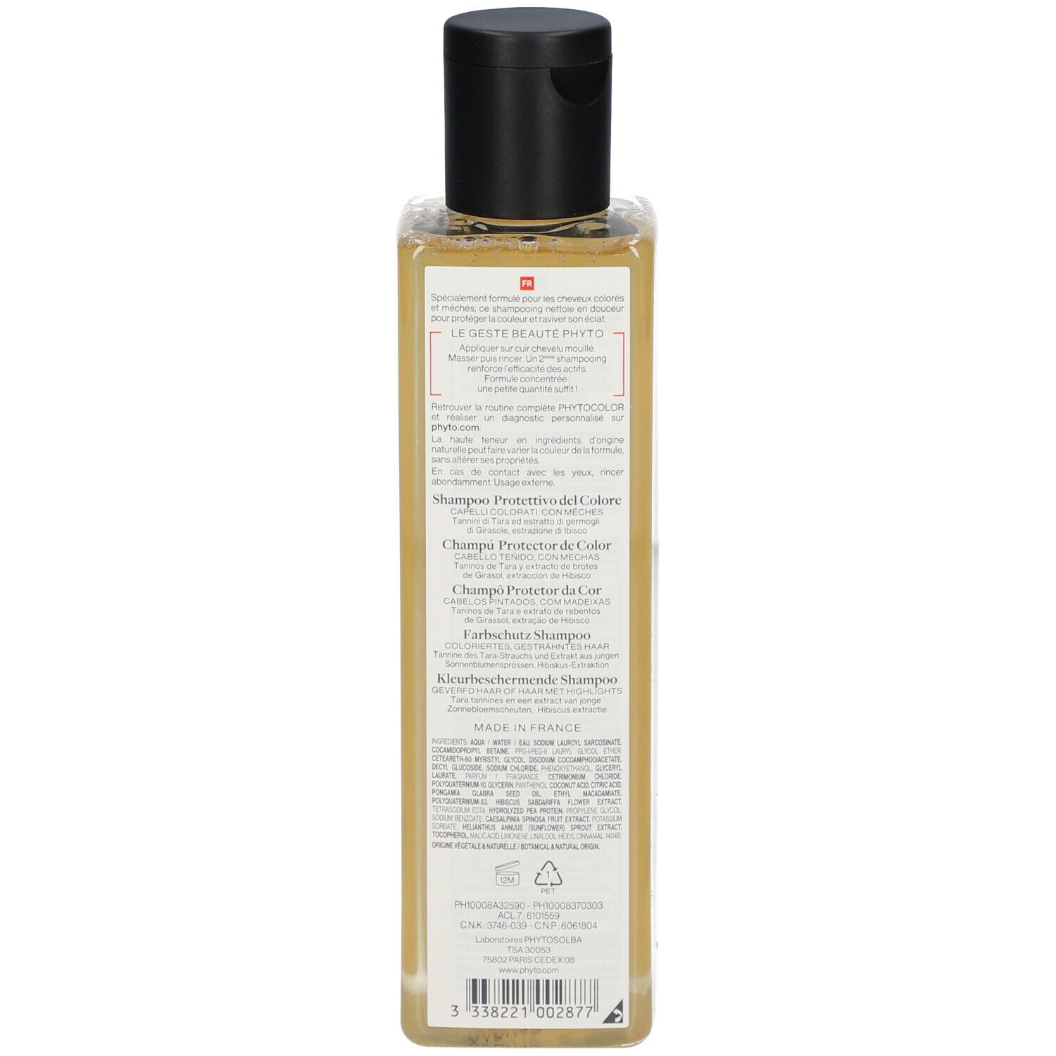 Achterkant van een shampoo fles. Tekst in meerdere talen. Informatie over het product en de ingrediënten.