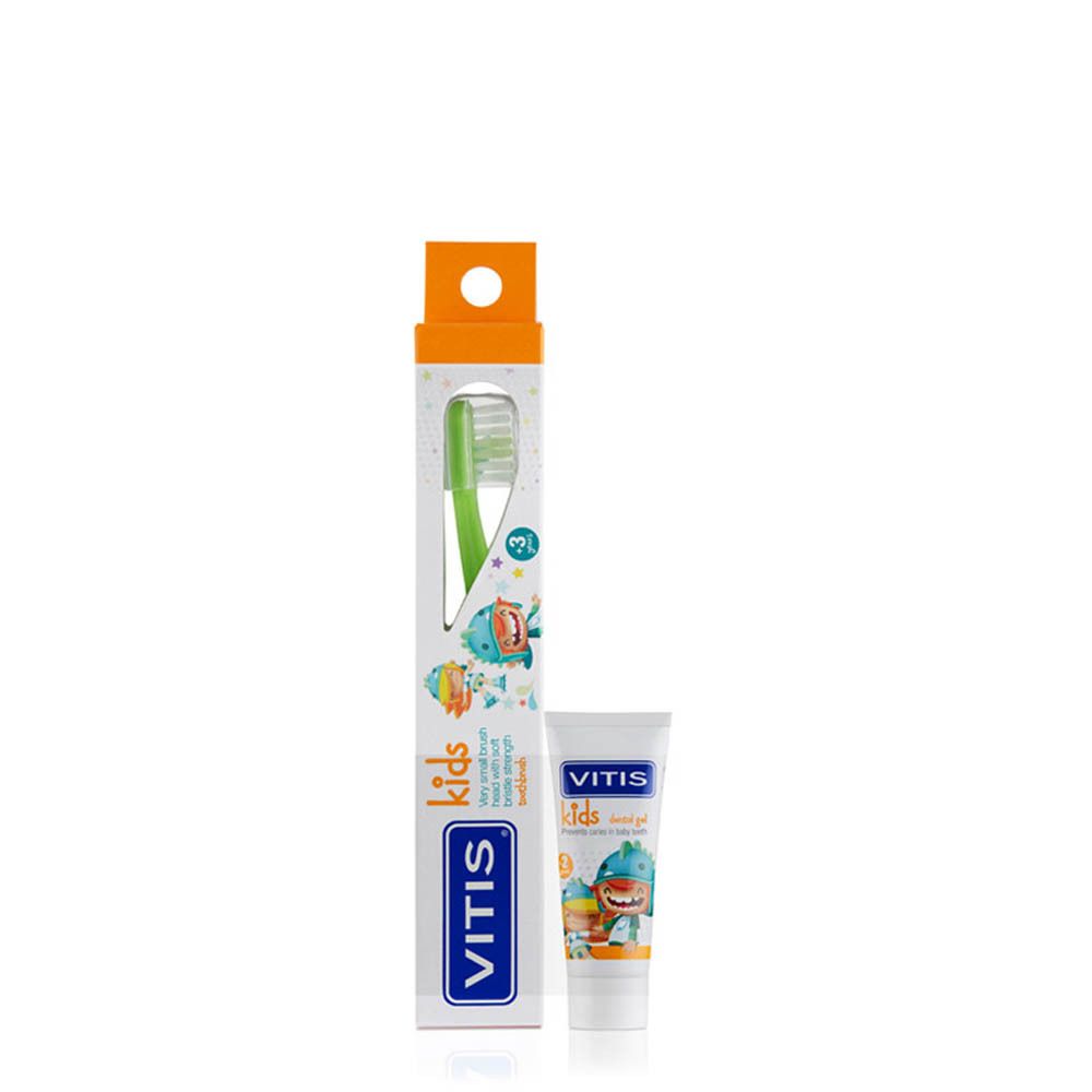 Een kindertandenborstel en tandpasta in een verpakking. De verpakking is langwerpig en toont de producten.