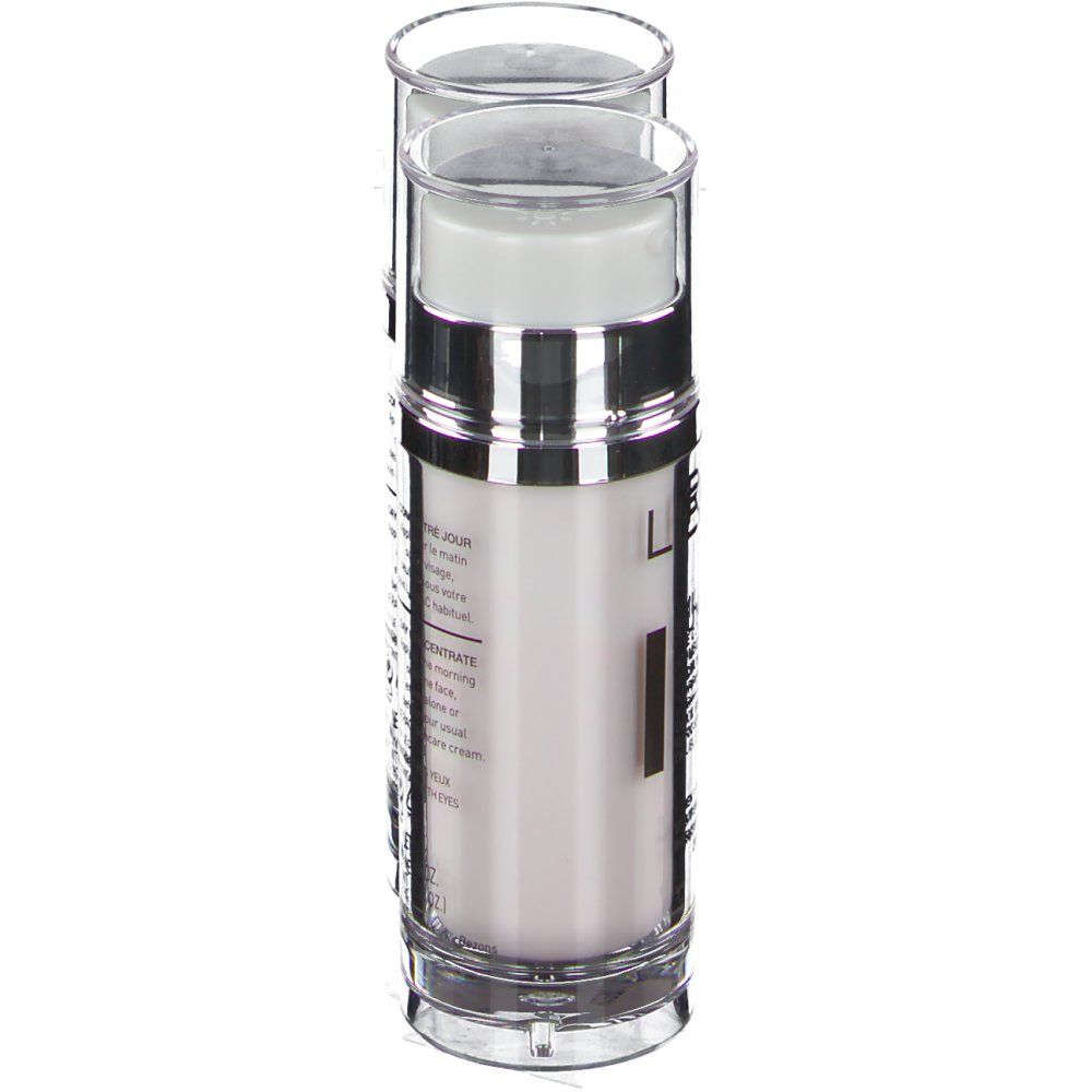 Eine Flasche LIERAC Lumilogie. Graue zylindrische Flasche mit transparentem Deckel. Aufschrift: Lumilogie, Double Concentré.