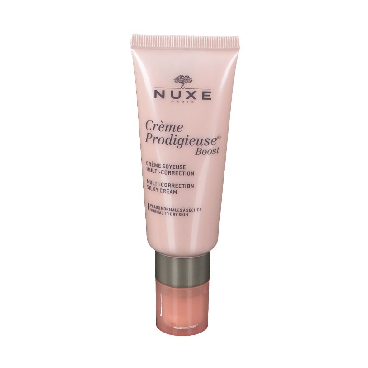 Tube rose de crème. Inscription: NUXE, Crème Prodigieuse Boost. Crème pour peaux normales à sèches.
