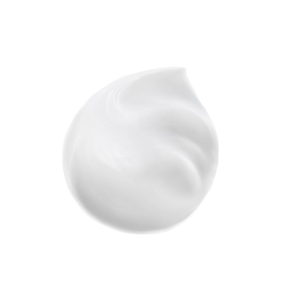 Klodder crème. Witte, romige textuur. Afgeronde vorm.
