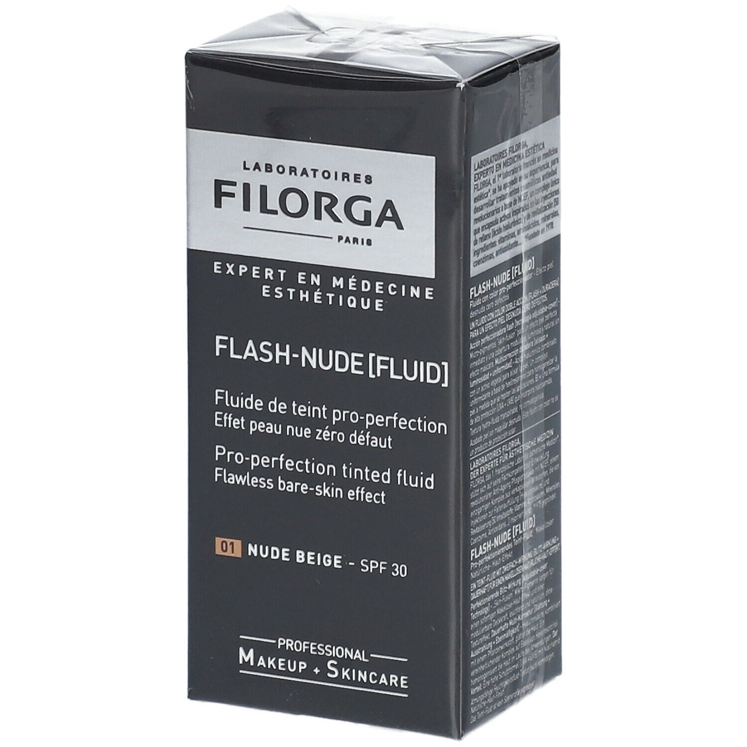 FILORGA FLASH-NUDE FLUID SPF30. Schwarze Verpackung mit Produktinformationen. Text: FLASH-NUDE [FLUID], 01 NUDE BEIGE, SPF 30.