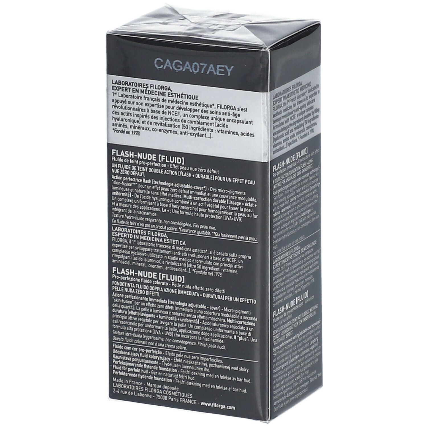 FILORGA FLASH-NUDE FLUID SPF30. Schwarze Verpackung mit Produktinformationen. Text: FLASH-NUDE [FLUID], NUDE BEIGE, SPF 30.