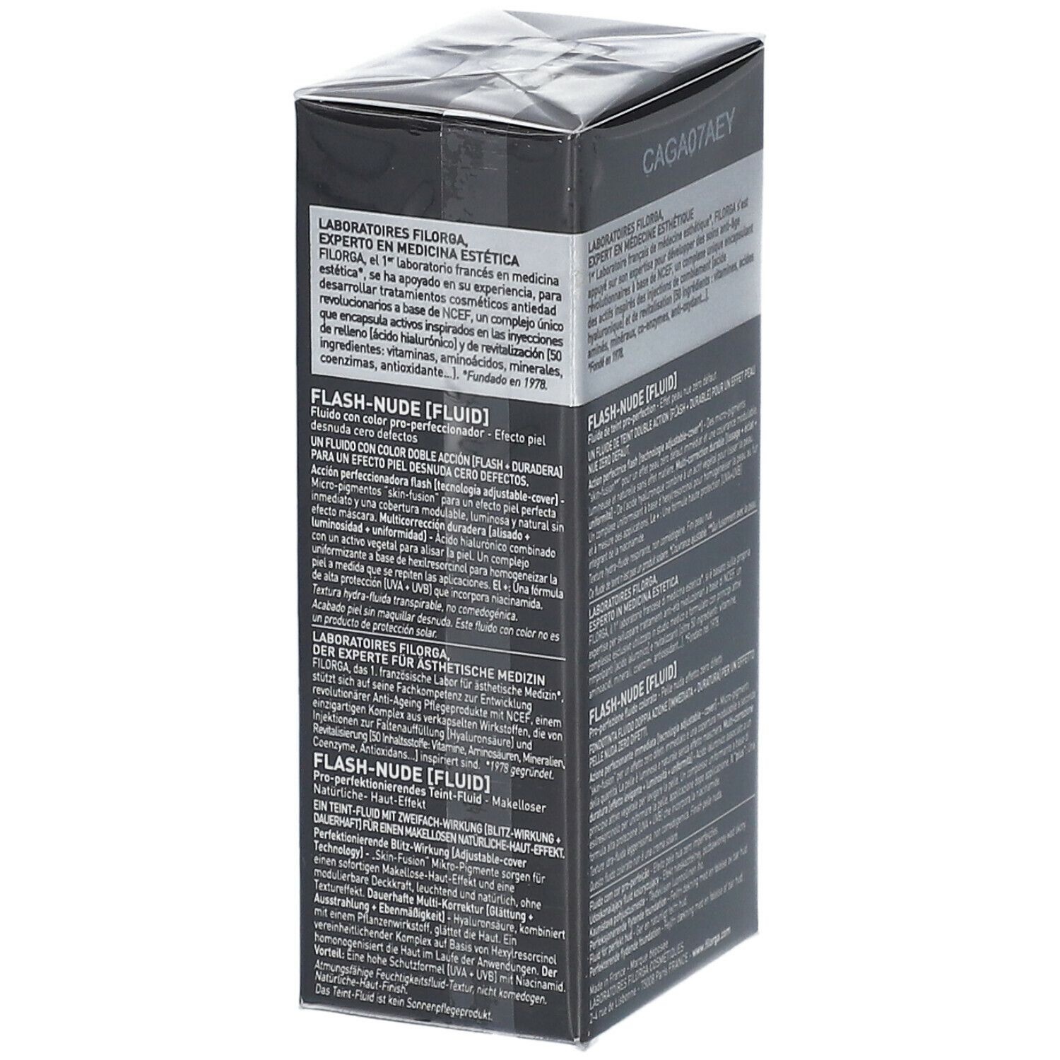 FILORGA FLASH-NUDE FLUID SPF30. Schwarze Verpackung mit Produktinformationen. Text: FLASH-NUDE [FLUID], NUDE BEIGE, SPF 30.