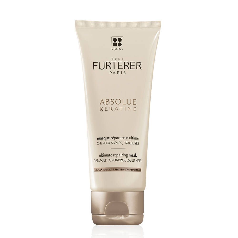 Tube crème avec nom et logo du produit. Texte : Absolue Kératine, masque réparateur ultime. Tube beige, bouchon marron.