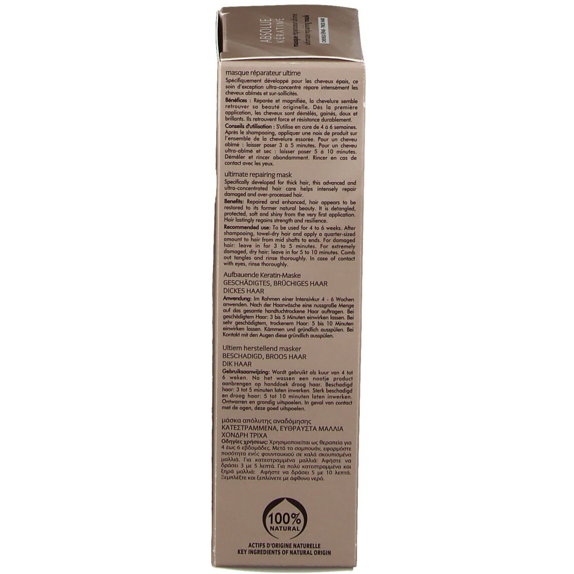 Côté de l'emballage. Texte multilingue. Ingrédients 100% naturels. Pour cheveux abîmés.