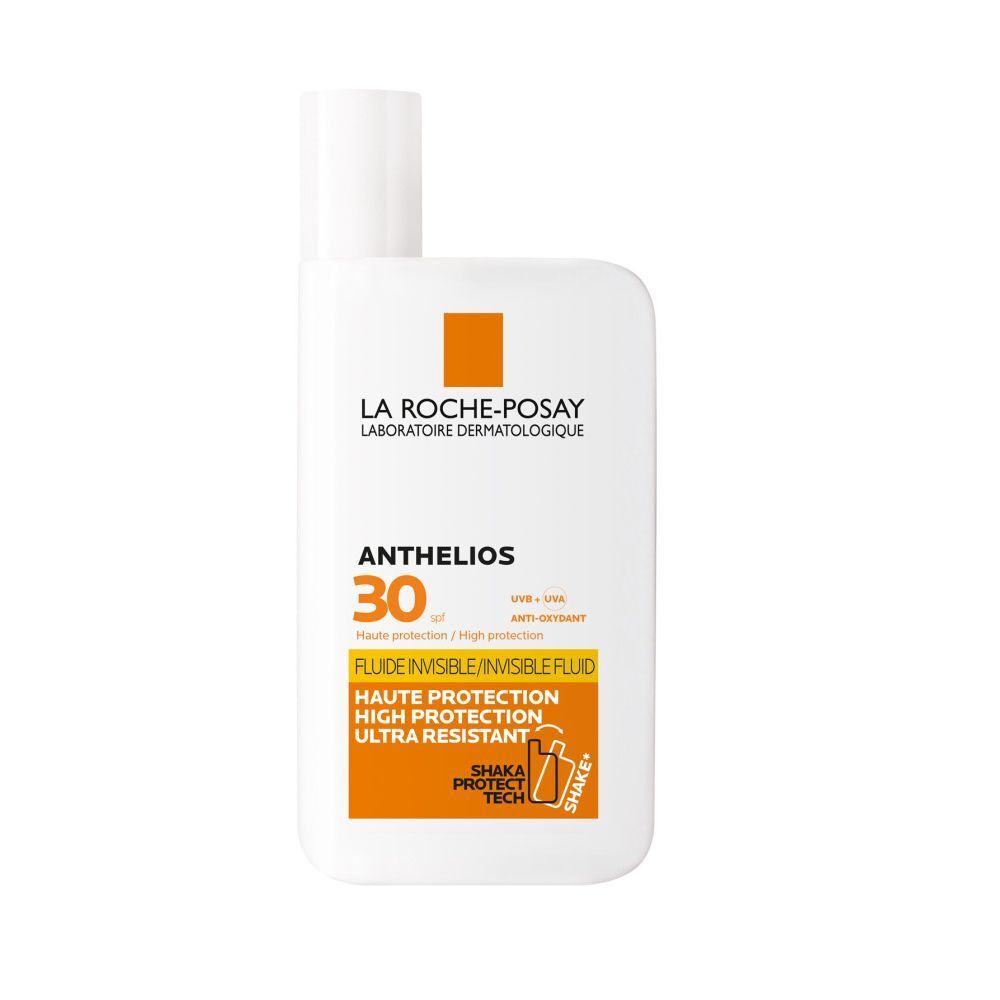 LA ROCHE-POSAY ANTHELIOS 30 Shaka Fluid. Witte fles met oranje details. Zonnebrandcrème.