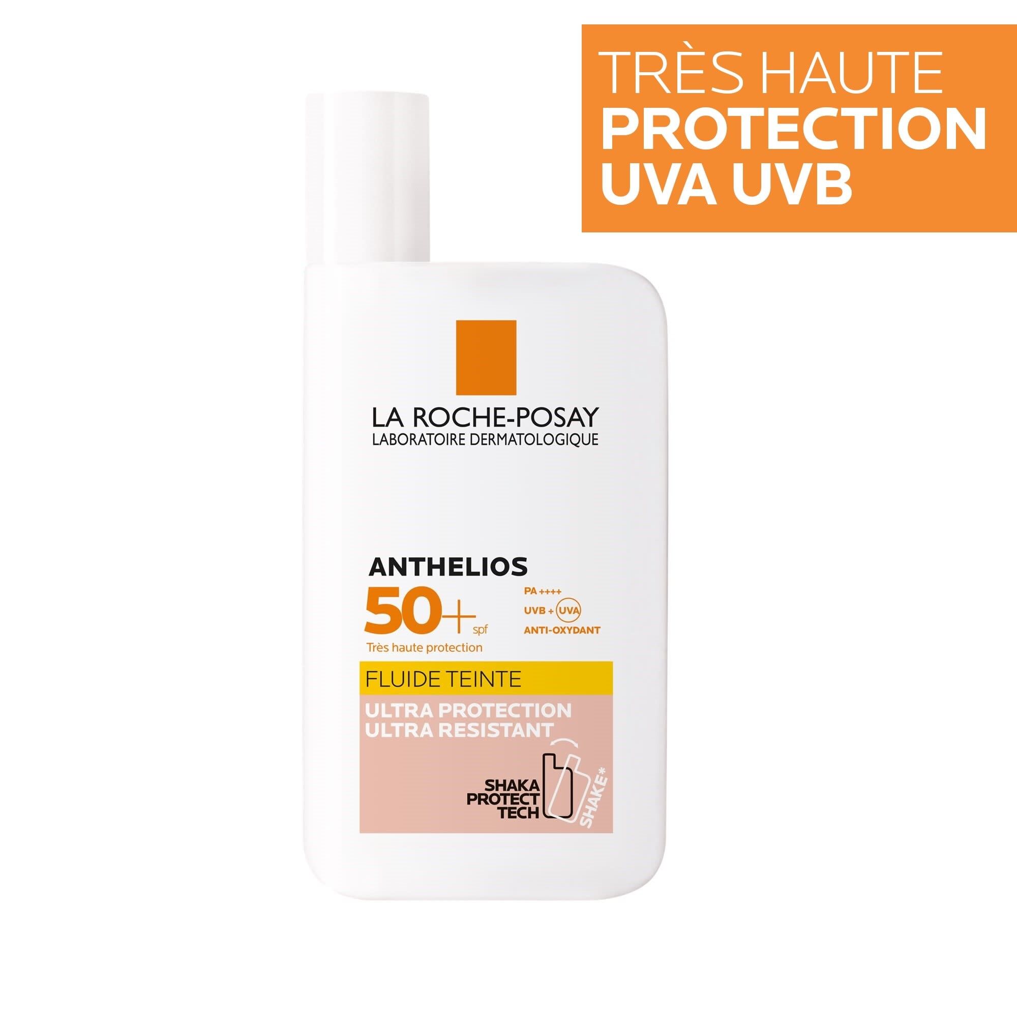 La Roche-Posay ANTHELIOS SHAKA FLUID LSF 50+ GETÖNT. Weiße Flasche. Text: FLUIDE TEINTE, ULTRA PROTECTION, ULTRA RESISTANT. Orangefarbener Aufkleber: TRÈS HAUTE PROTECTION UVA UVB.