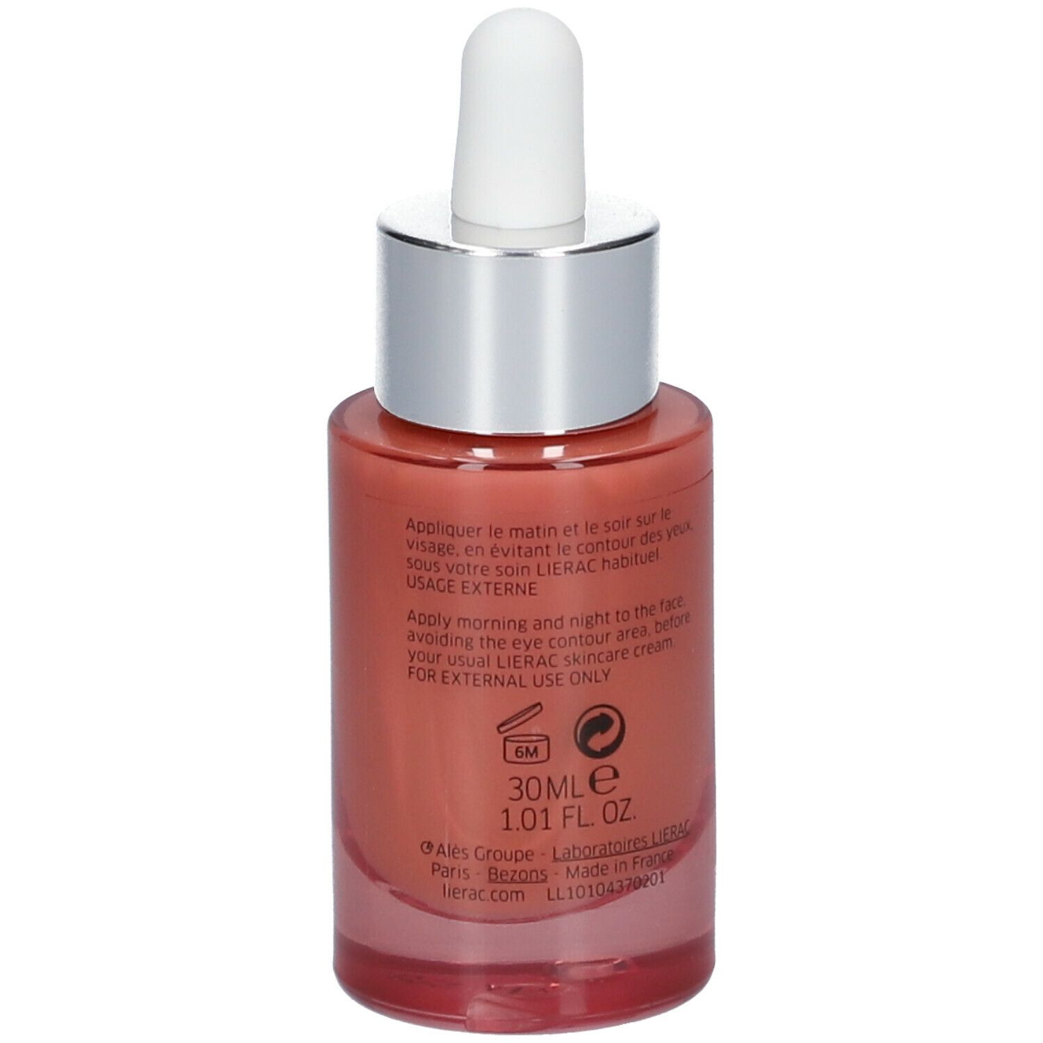 Vue arrière d'un flacon de sérum rose avec texte: Lierac, Supra Radiance. Contient des informations sur l'utilisation et les ingrédients.