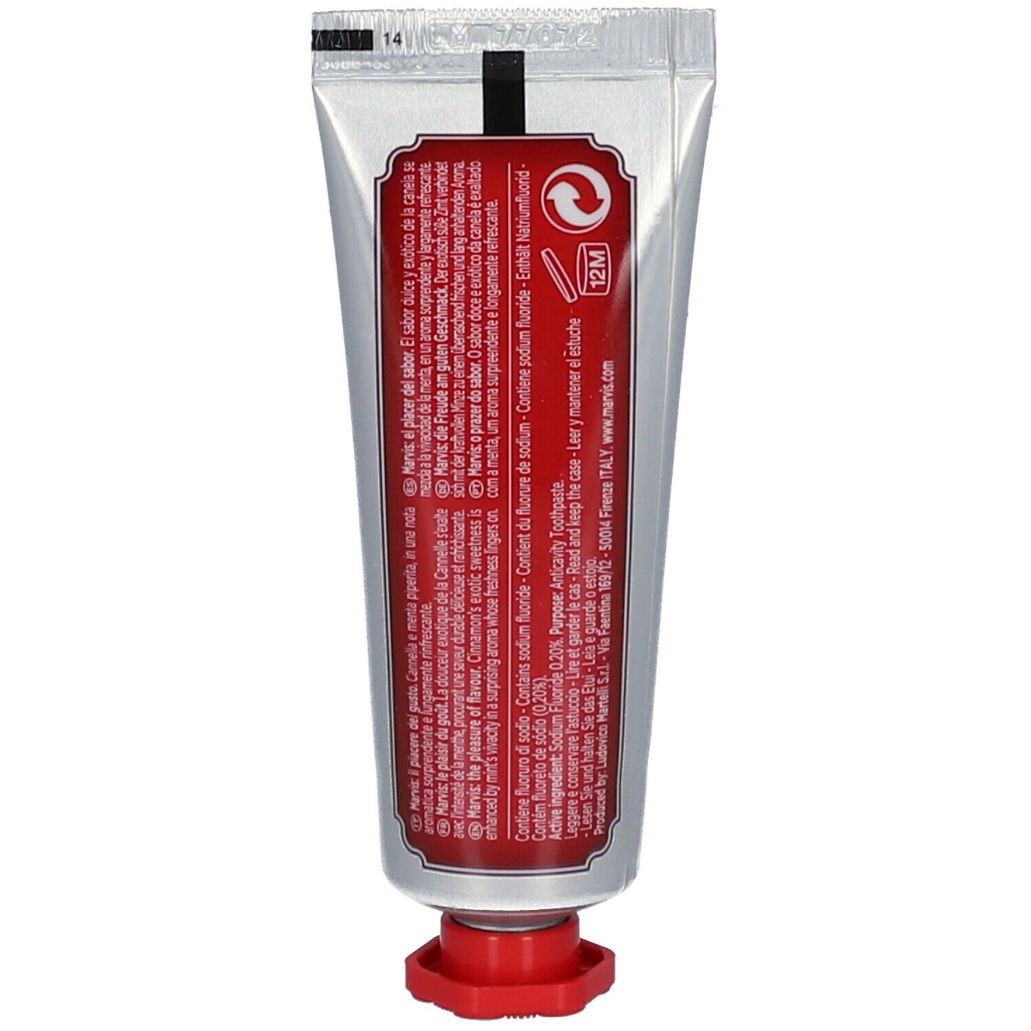 Dos d'un tube argenté. Fond rouge avec texte. Contient des informations sur le dentifrice.